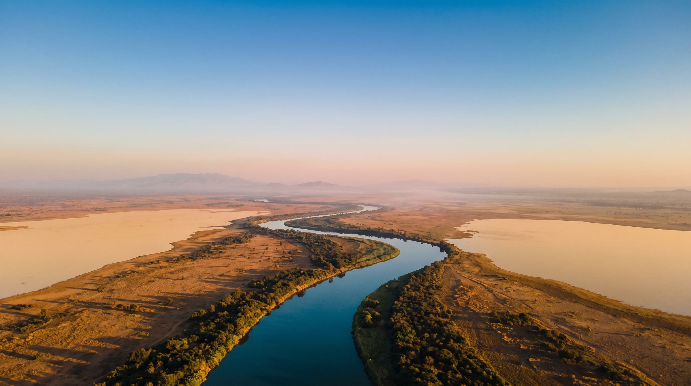 Aerial view of the Nile winding through South Sudan at golden hour